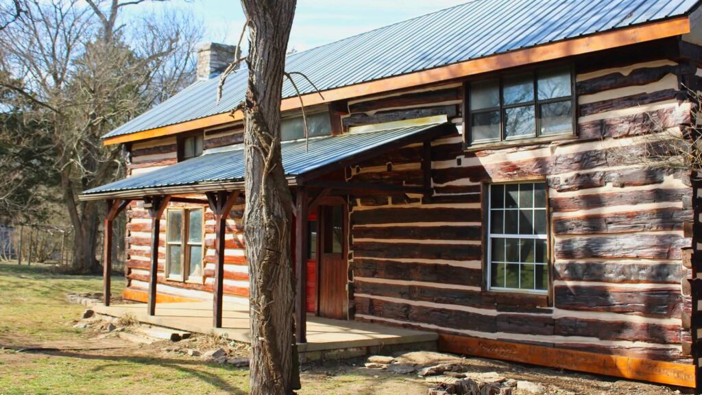 A log cabin home in great shape after we repaired, chinked, and caulked the exterior